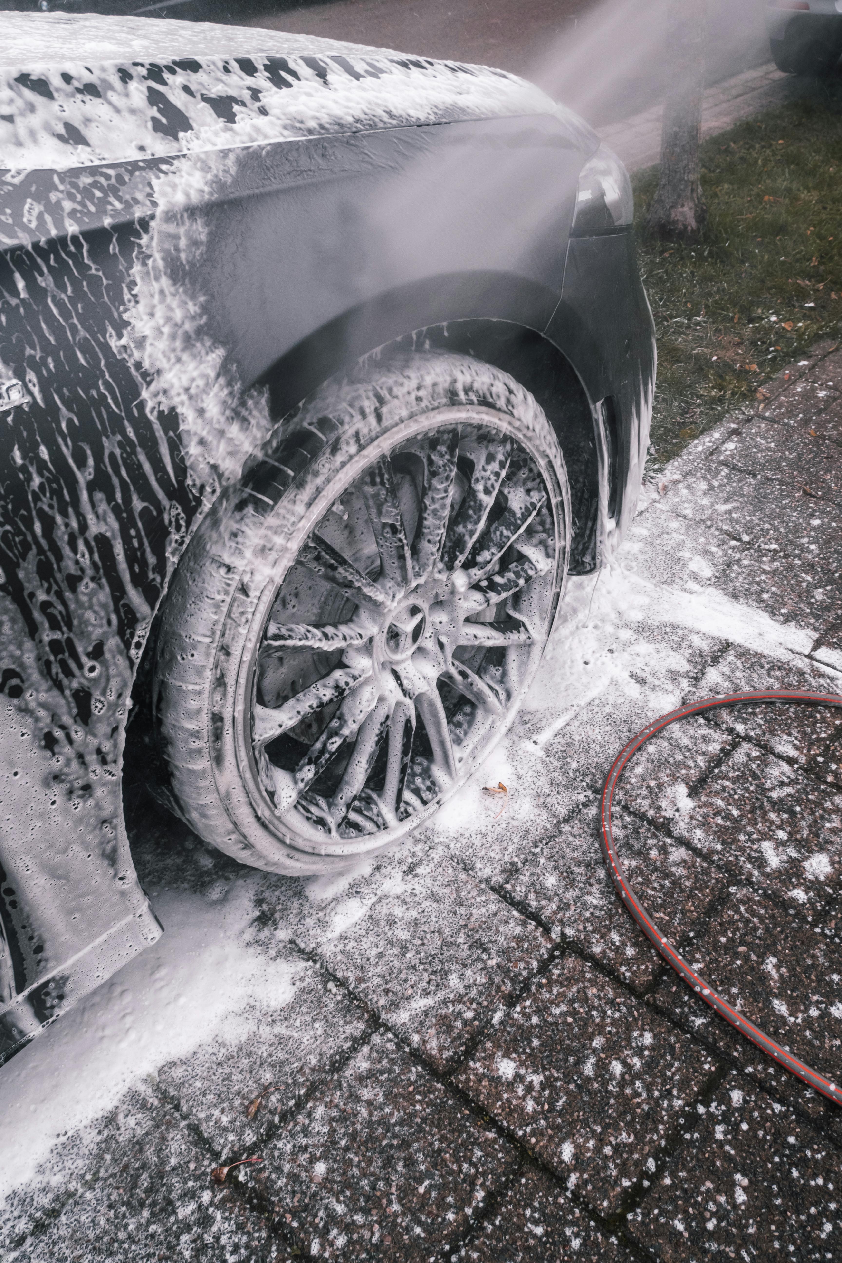 A close-up of a foam-covered Mercedes wheel